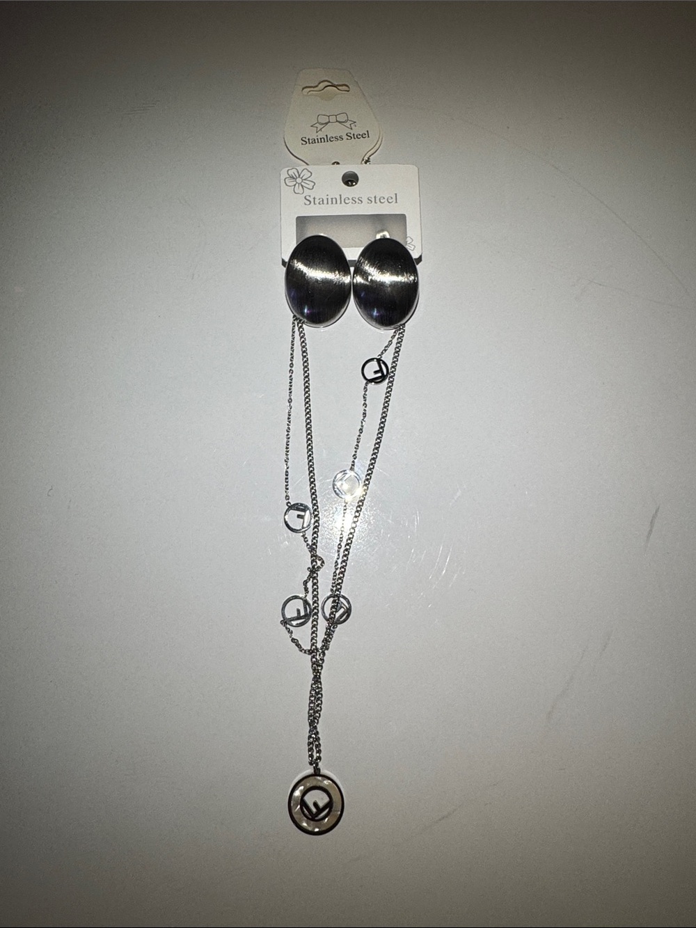 Stainless Steel Layered Pendant Necklace in Silver